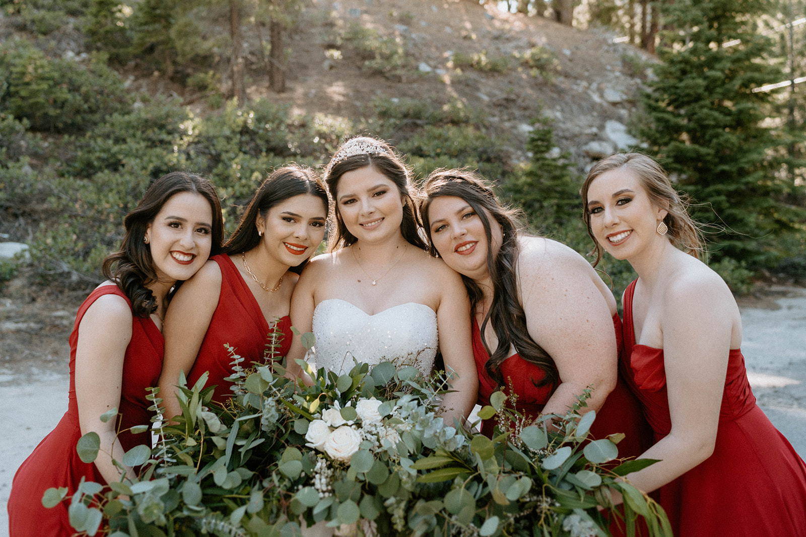 Montse's bridesmaids in red dresses at Tannenbaum - DJs In Reno wedding services