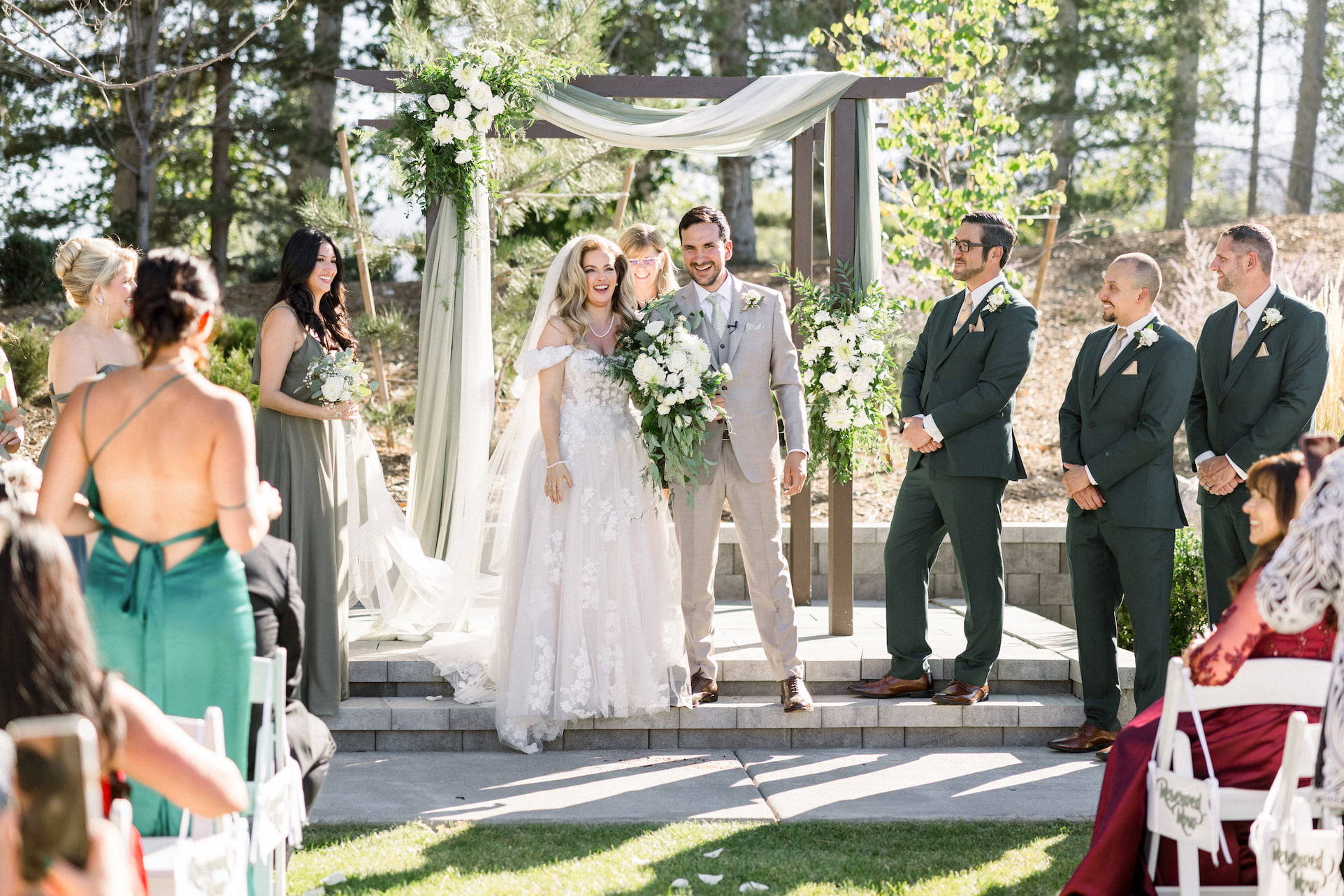 Brittany and Christopher walking down the aisle - DJs In Reno