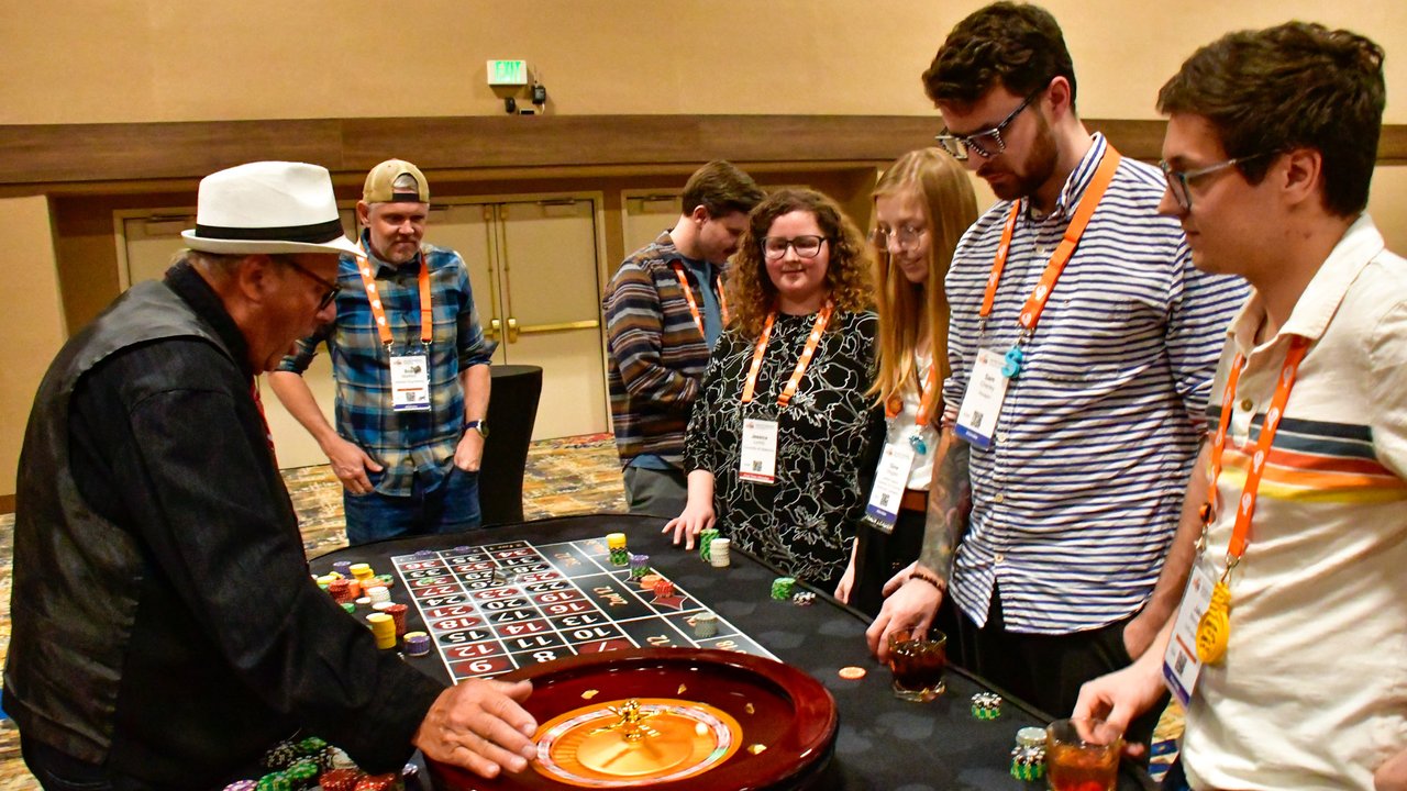 AMUG guests gathered around the roulette table on the second night