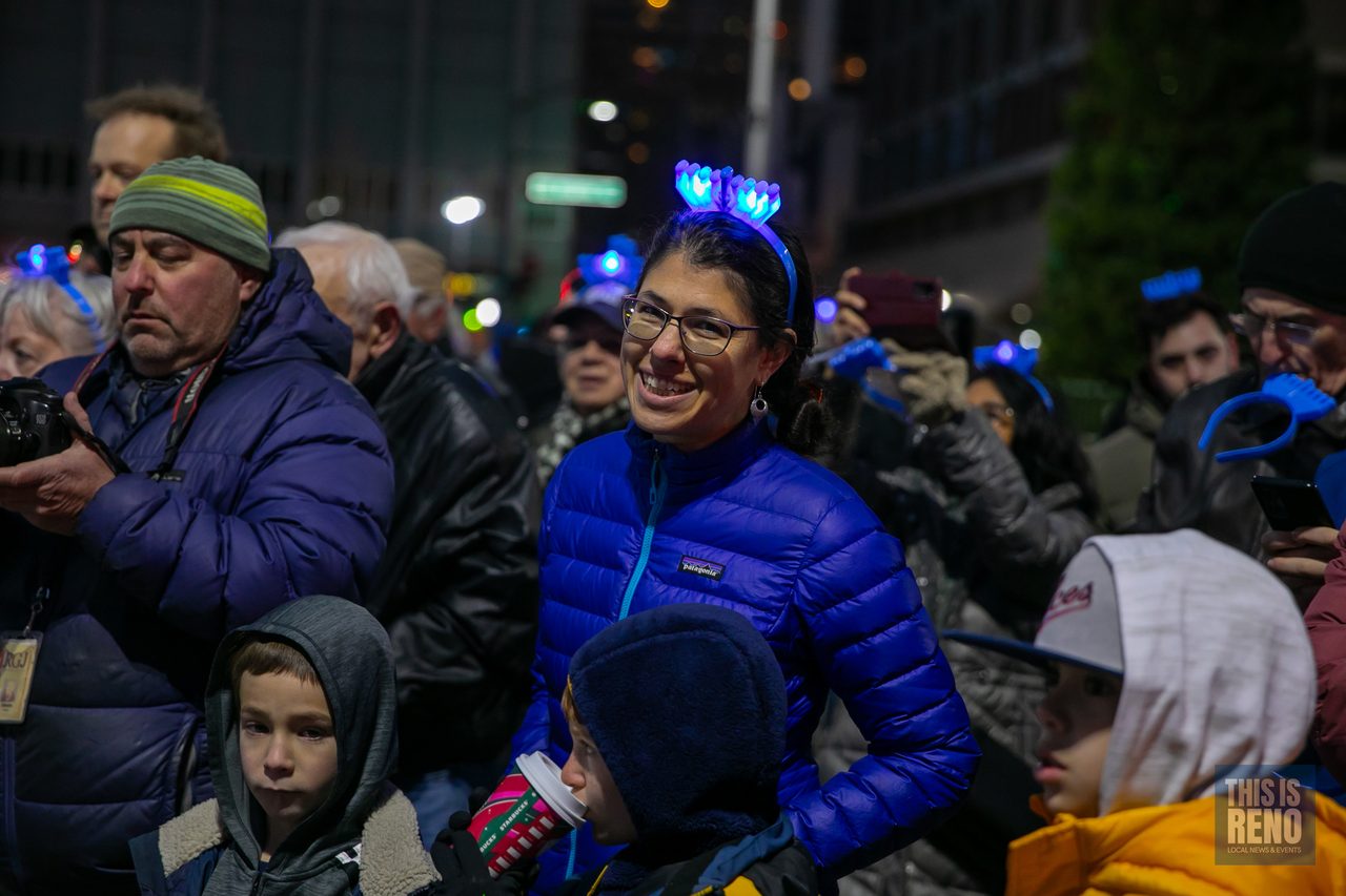 Smiling faces in the crowd at the ceremony