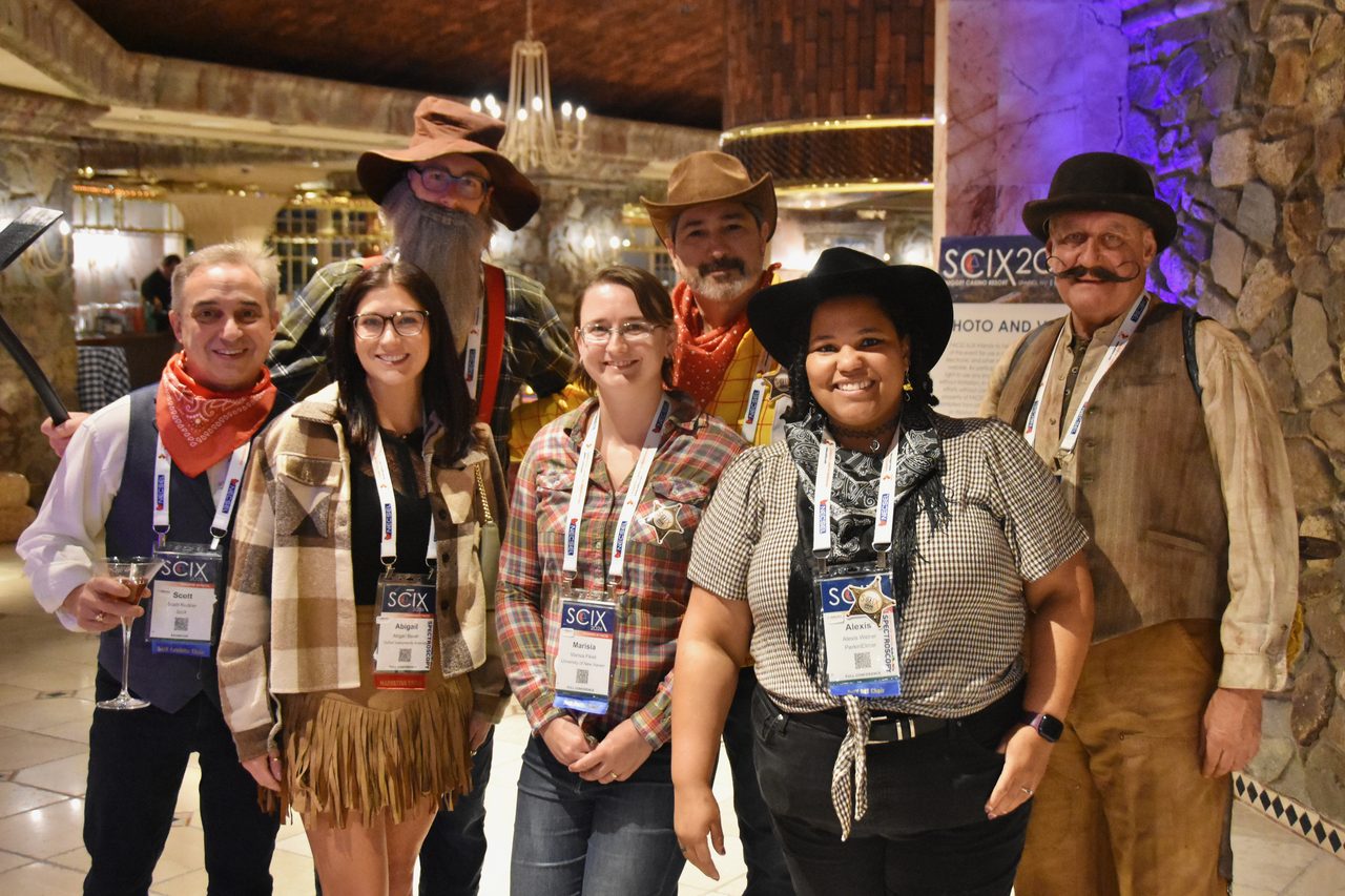 SciX Gala guests in western costumes in the Nugget foyer