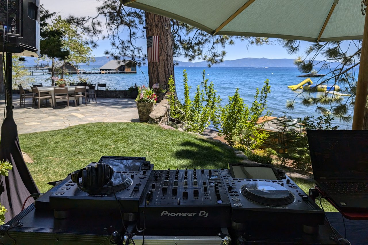 Pioneer DJ decks on the lawn facing Lake Tahoe at a Fourth of July party