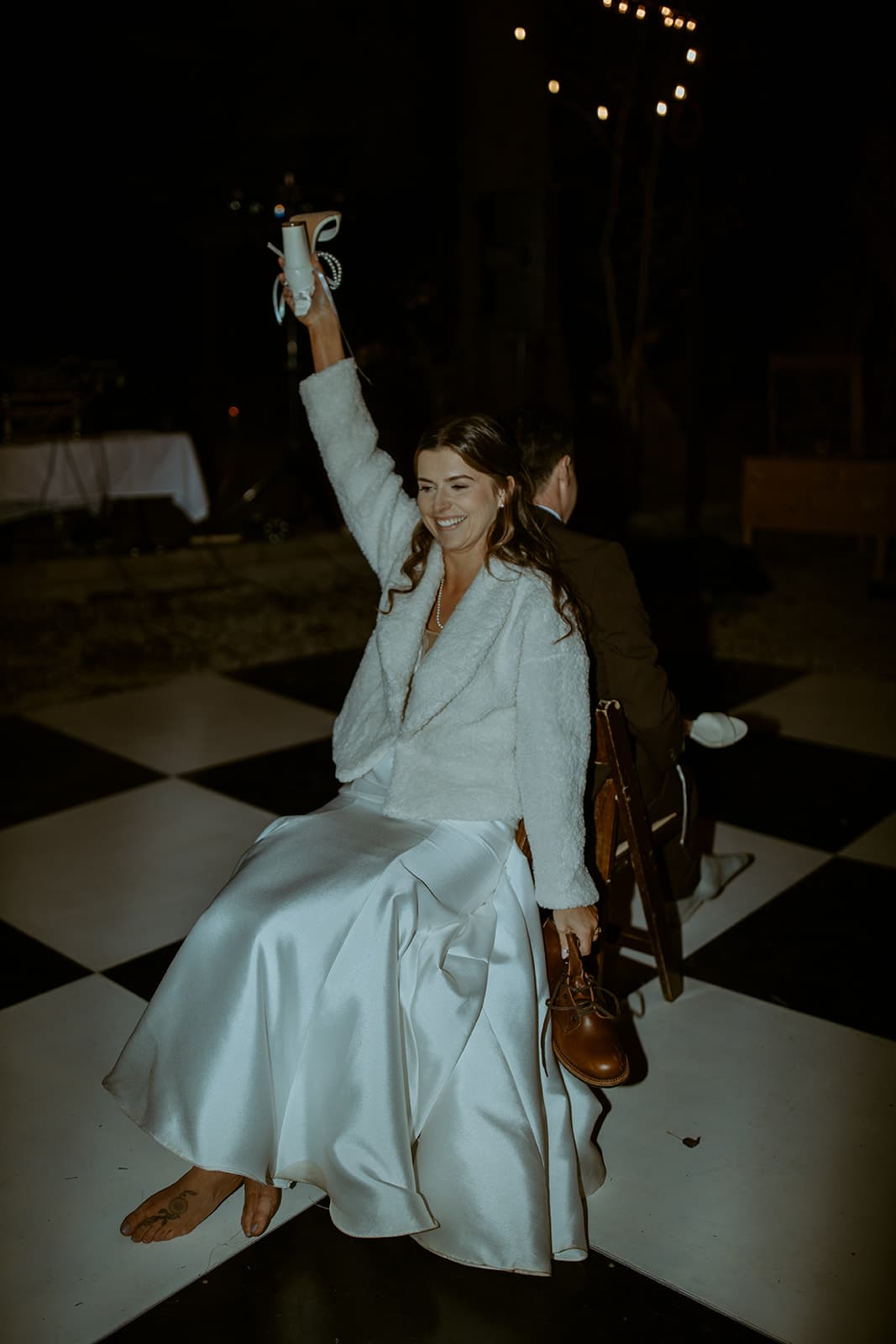 Devin & Emily playing the shoe game at their wedding reception - DJs In Reno