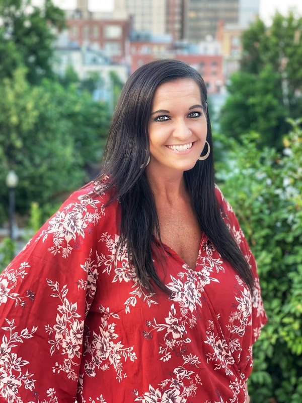 Ashley smiling in a close portrait