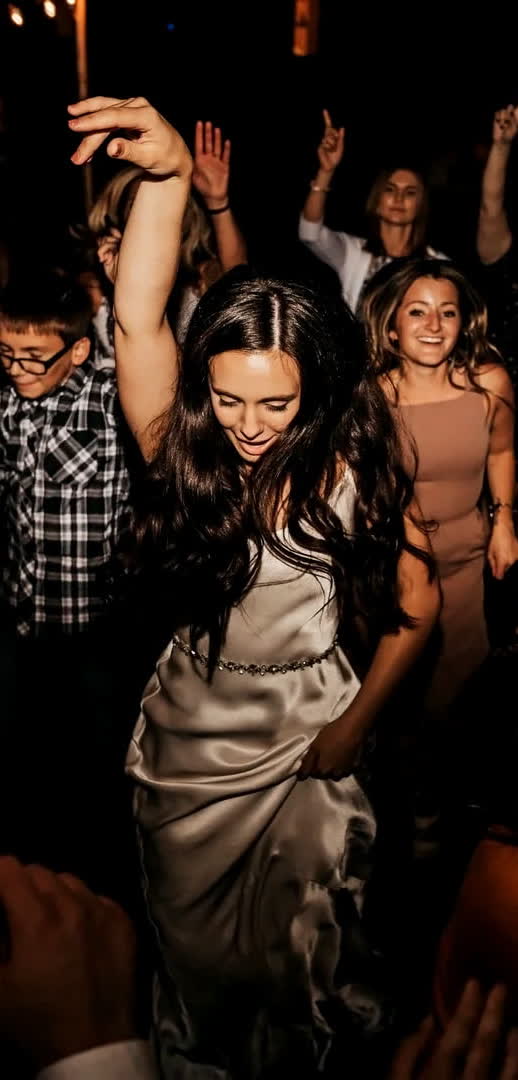 A packed dance floor at Lindsey and Nathaniel's wedding reception, DJ'd by DJs In Reno at Twenty Mile House in Graeagle, California.
