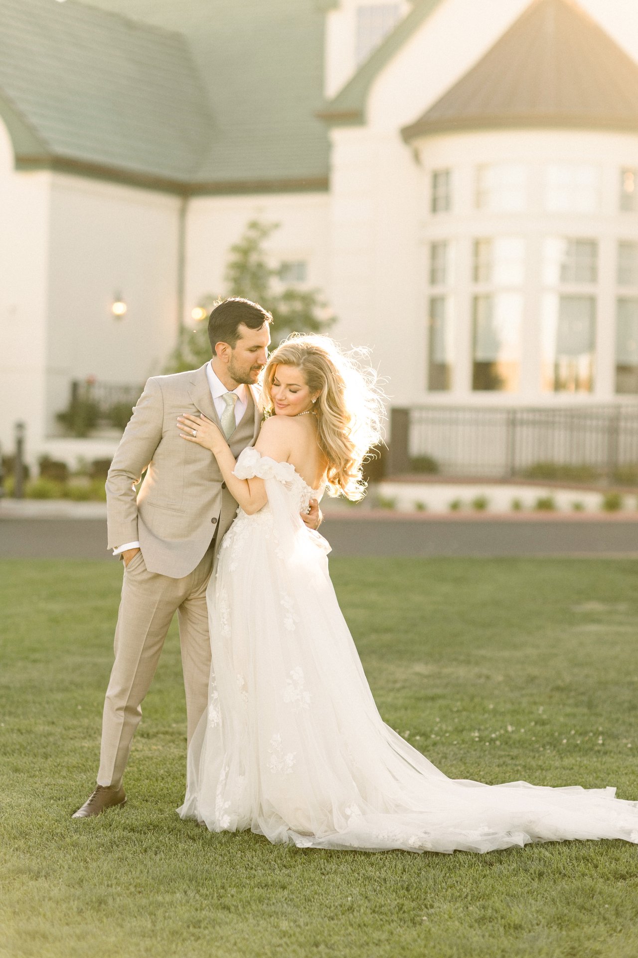 Britt and Chris hold each other in the evening light