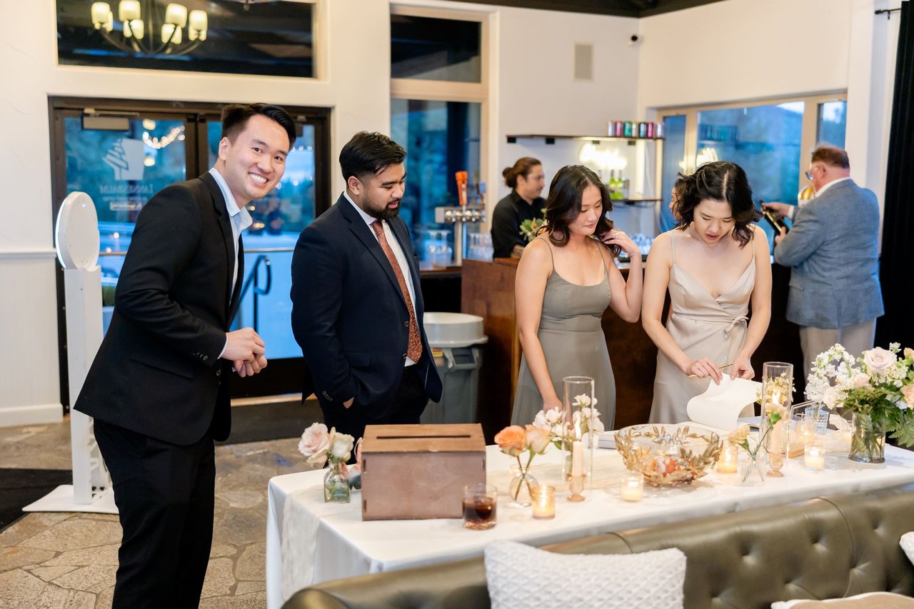 Guests gather at the card and gift table