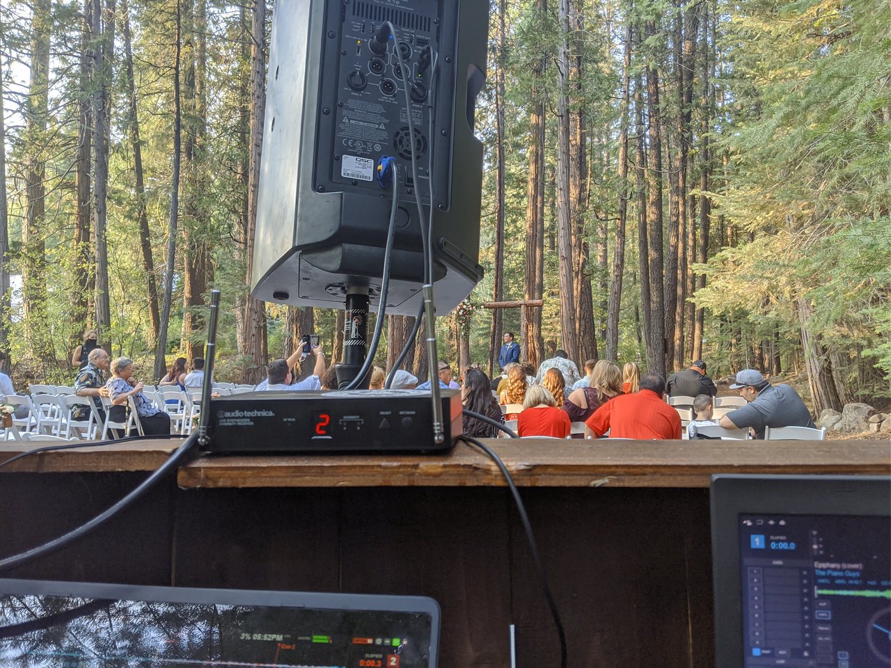 The forest ceremony at Twenty Mile House from my DJ booth, Kyle waiting at the wooden arch