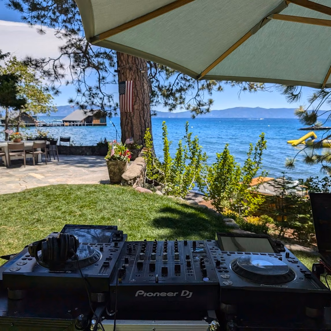Pioneer DJ decks set up on a lakefront lawn for a private party in Tahoe City