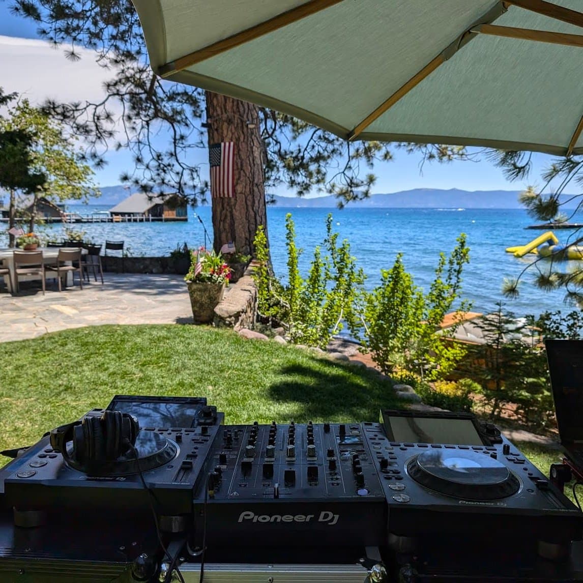 Pioneer DJ decks set up on a lakefront lawn for a private party in Tahoe City